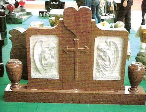 Grave Memorial with shape carved designs